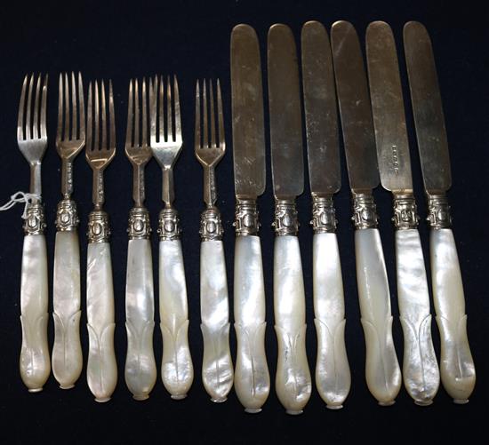 Six pairs of Victorian mother of pearl handled silver dessert eaters by John Gilbert & Co, Birmingham, 1862.